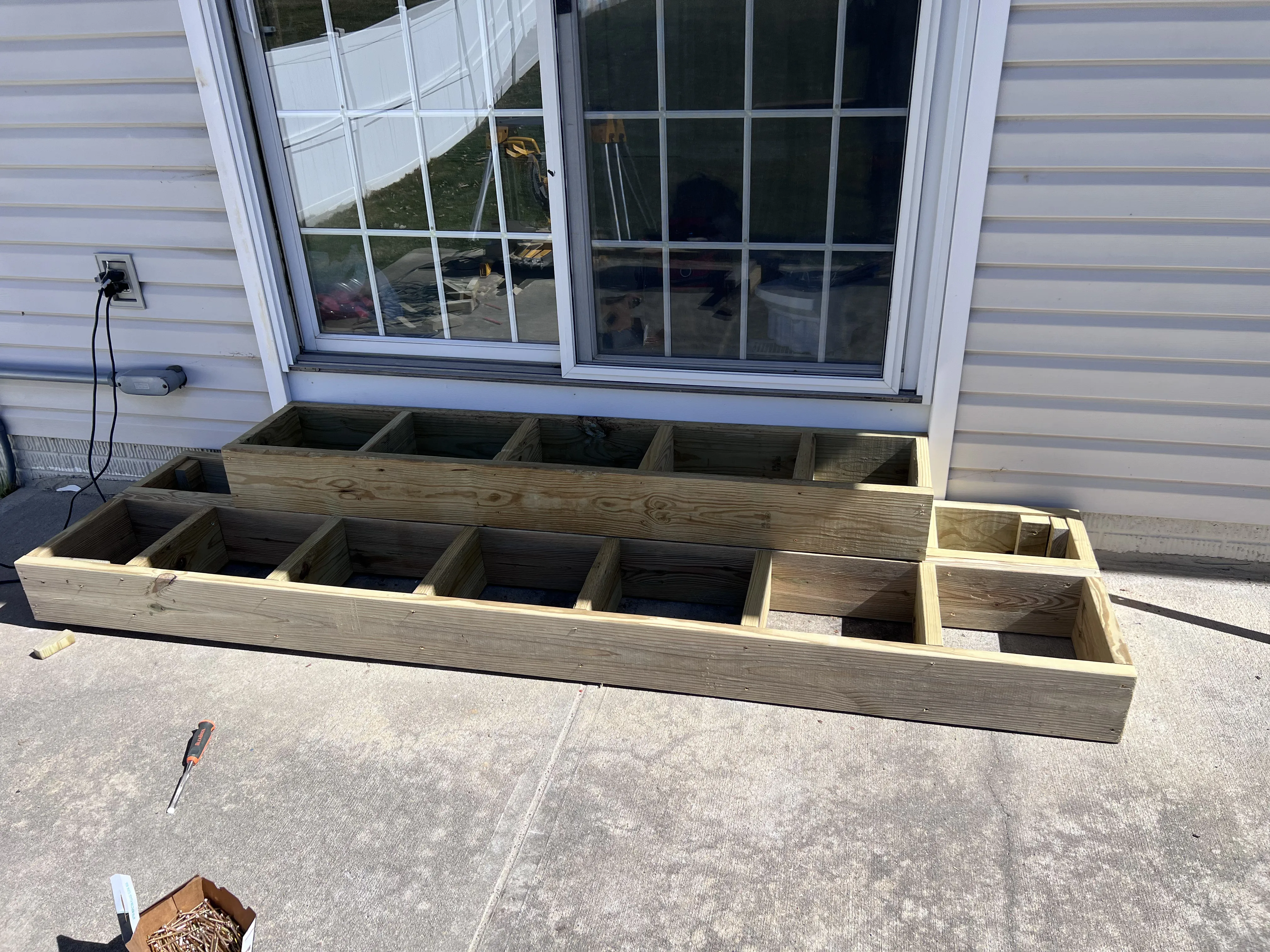 New treated-lumber step framing built on the concrete